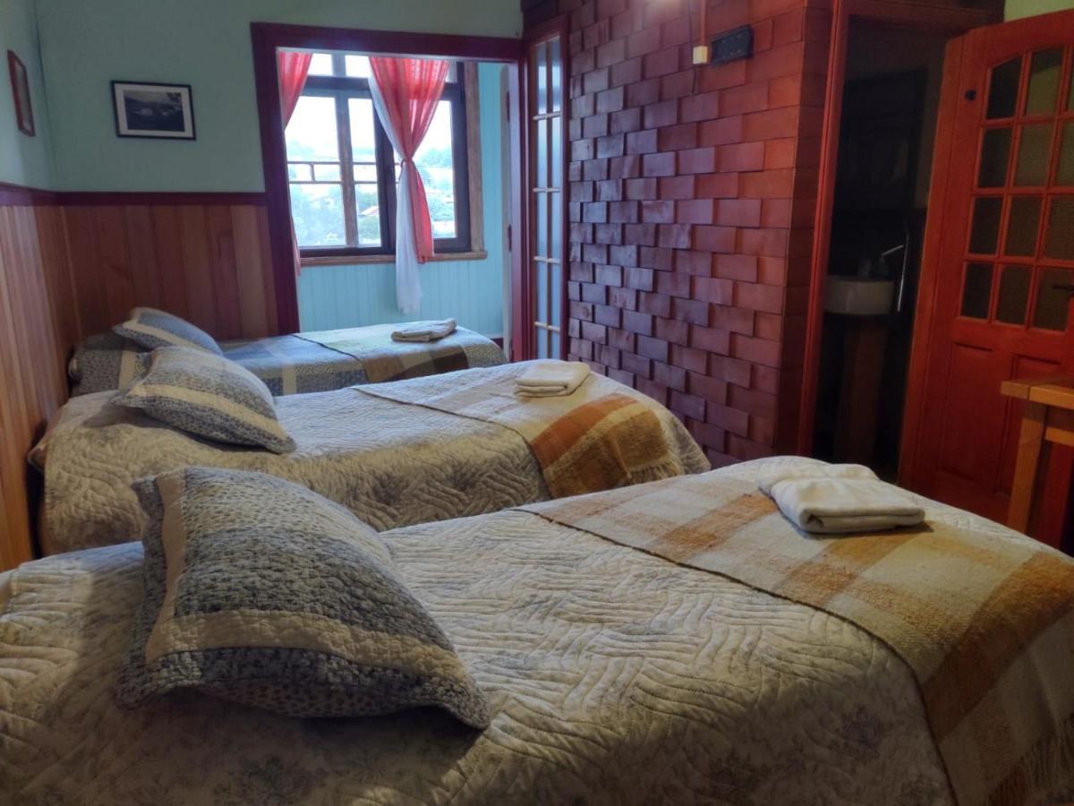 Hostal Casa Florencia ปูแอร์โตบารัส ภายนอก รูปภาพ